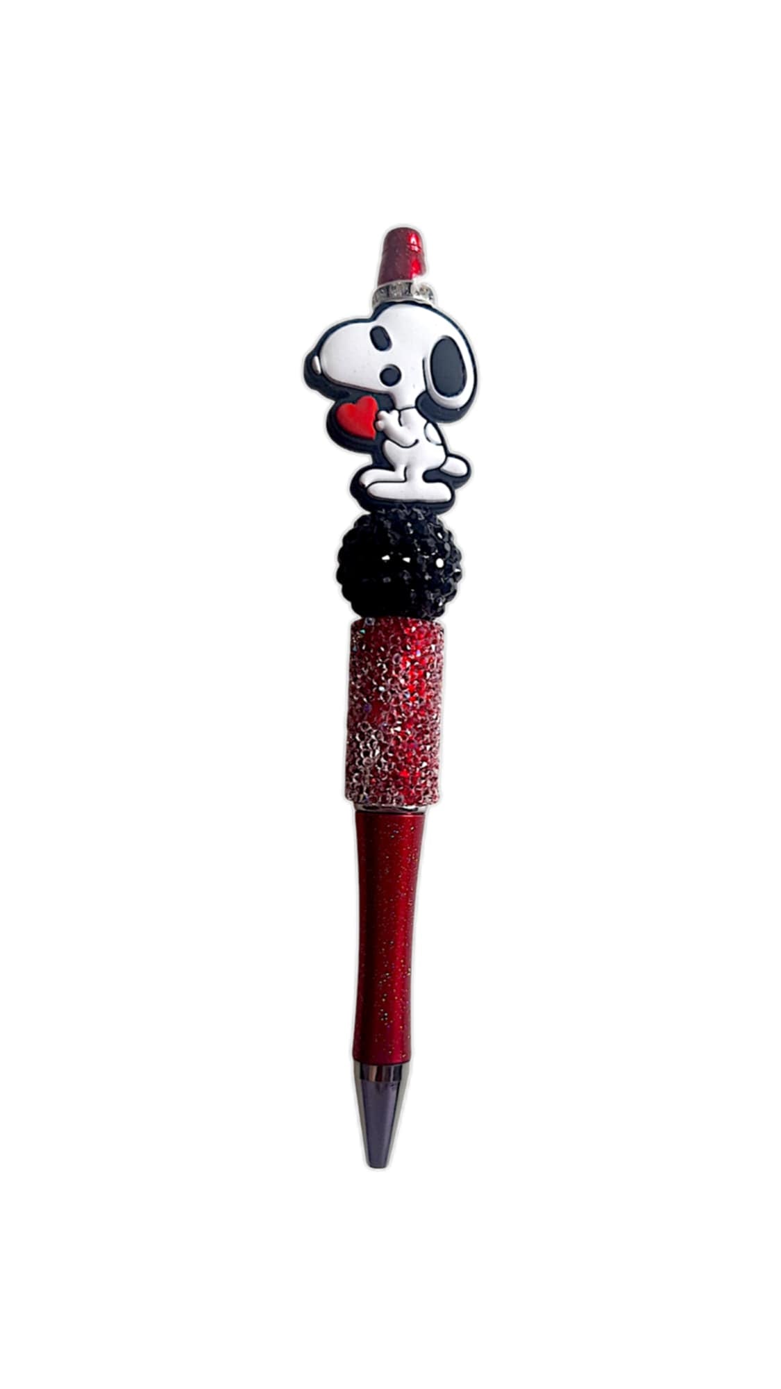 Dog holding heart beads pen