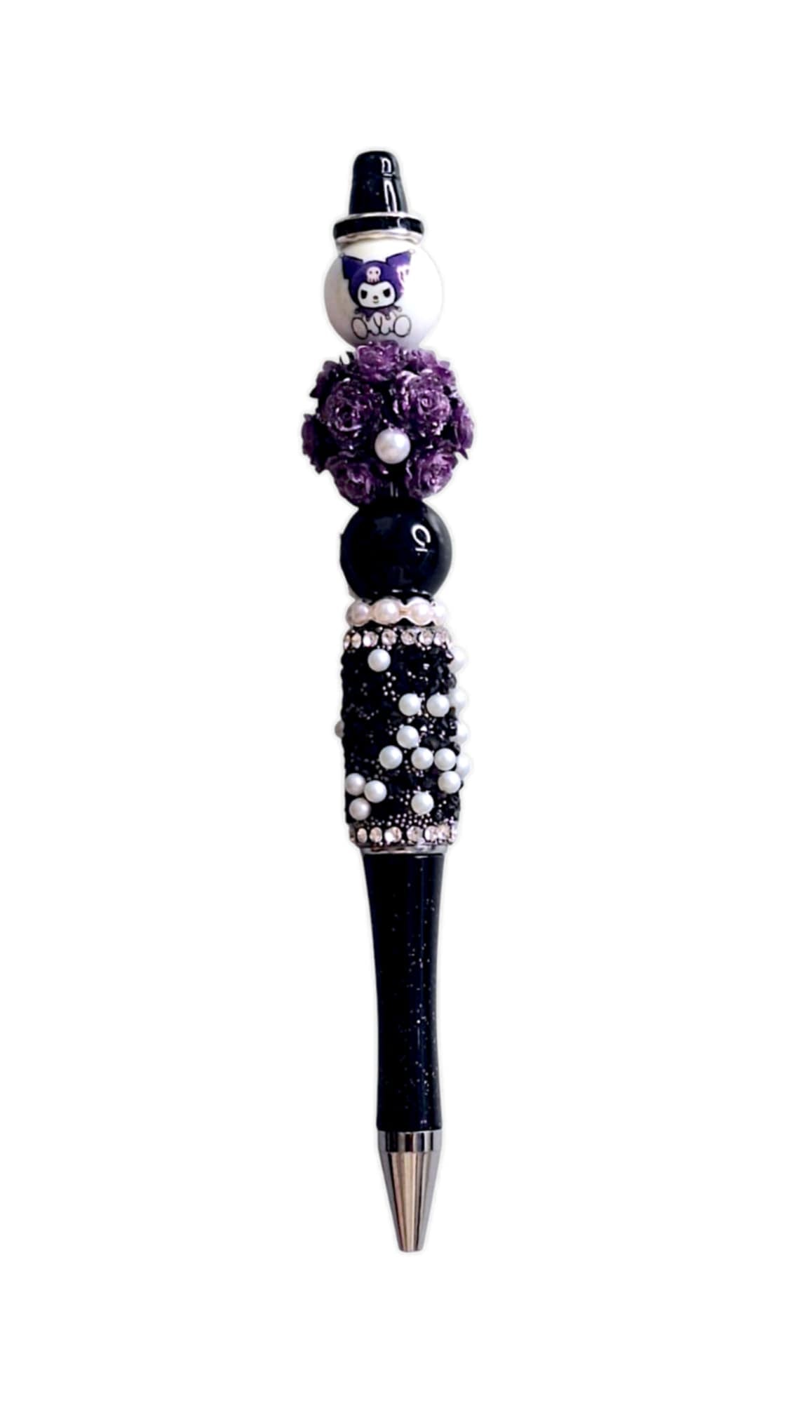 Joli stylo à perles violettes et noires